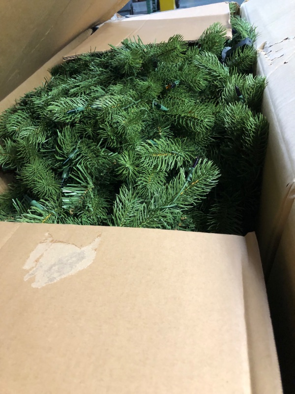 Photo 2 of **NON-FUNCITONAL*WIRES ARE CUT**
National Tree Company Pre-Lit 'Feel Real' Artificial Full Downswept Christmas Tree 6.5 ft