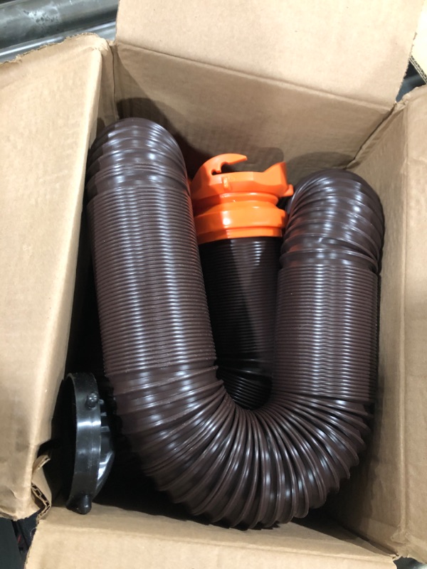 Photo 2 of Camco RhinoFLEX RV Sewer Hose Kit with Swivel Transparent Elbow and 4-in-1 Dump Station Fitting, Brown, 15 Feet (39770) 15ft Sewer Hose Kit Frustration-Free Packaging