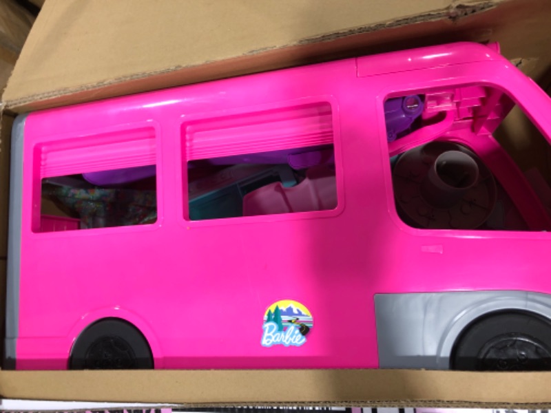 Photo 2 of Barbie Camper, DreamCamper Toy Playset with 60+ Barbie Accessories and Furniture Pieces, 7 Play Areas Including Pool and Slide
