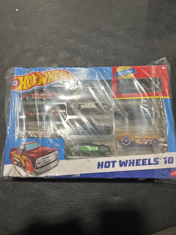 Photo 1 of Hot Wheels Toy Cars & Trucks in 1:64 Scale, Set of 10, Multipack of Die-Cast Race or Police Cars, Hot Rods, Firetrucks or Vans (Styles May Vary) (Amazon Exclusive) 10-Pack