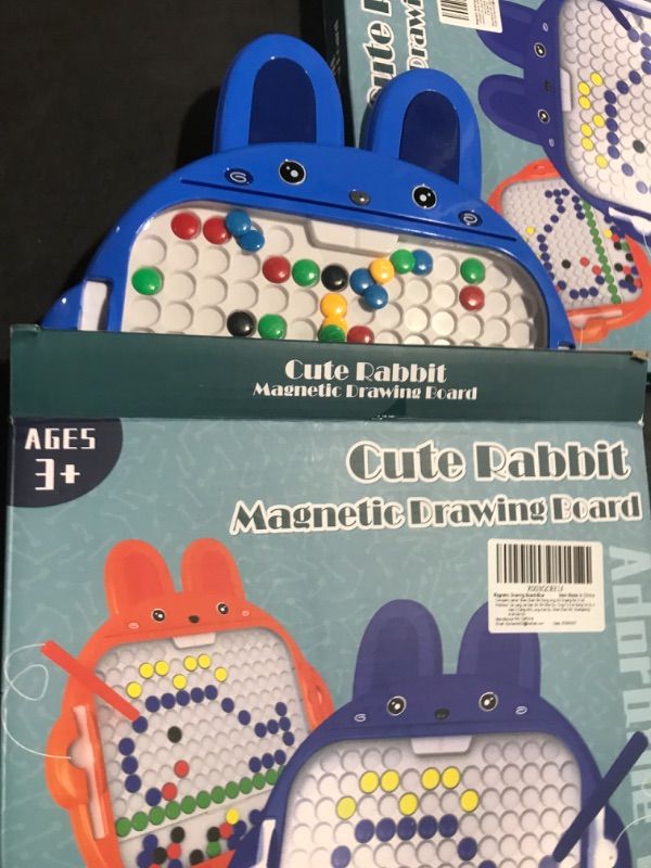Photo 1 of Magnetic Drawing Board for Kids Toddlers Large Doodle Board with 2 Magnetic Pens Rabbit Magnetic Dot Art Montessori Educational Preschool Toy Travel Toy for 3 4 5 6 Years Old Boys Girls Blue