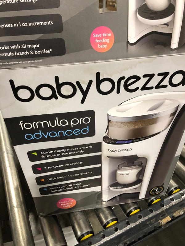 Photo 1 of New and Improved Baby Brezza Formula Pro Advanced Formula Dispenser Machine - Automatically Mix a Warm Formula Bottle Instantly - Easily Make Bottle with Automatic Powder Blending