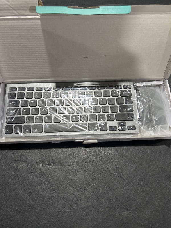 Photo 1 of Compact Wireless Keyboard Mouse, 2.4GHz Ultra Thin Small Wireless Keyboard Mouse Combo for Desktop, Laptop (Black and Gray)