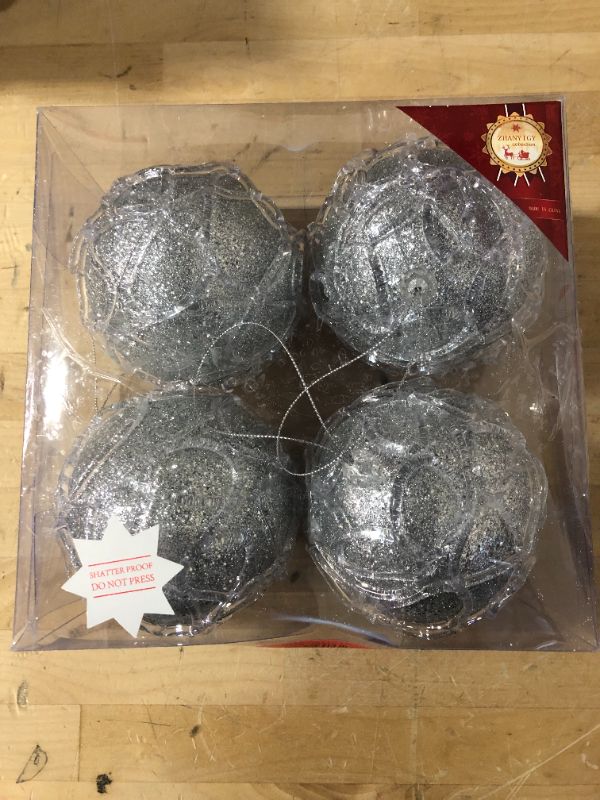 Photo 2 of ZHANYIGY 4.25" Christmas Ball Ornaments 4pc Set Silver Christmas Decorations Tree Balls for Xmas Trees Wedding Party Holiday Decorations Tabletop Small Trees Decoration