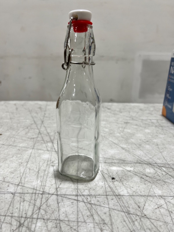 Photo 1 of 12 glass bottles 