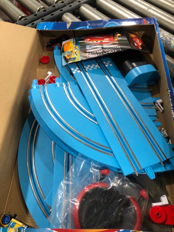 Photo 1 of Carrera First Disney/Pixar Cars - Slot Car Race Track - Includes 2 Cars: Lightning McQueen and Dinoco Cruz - Battery-Powered Beginner Racing Set for Kids Ages 3 Years and Up Disney Cars w/ Spinners