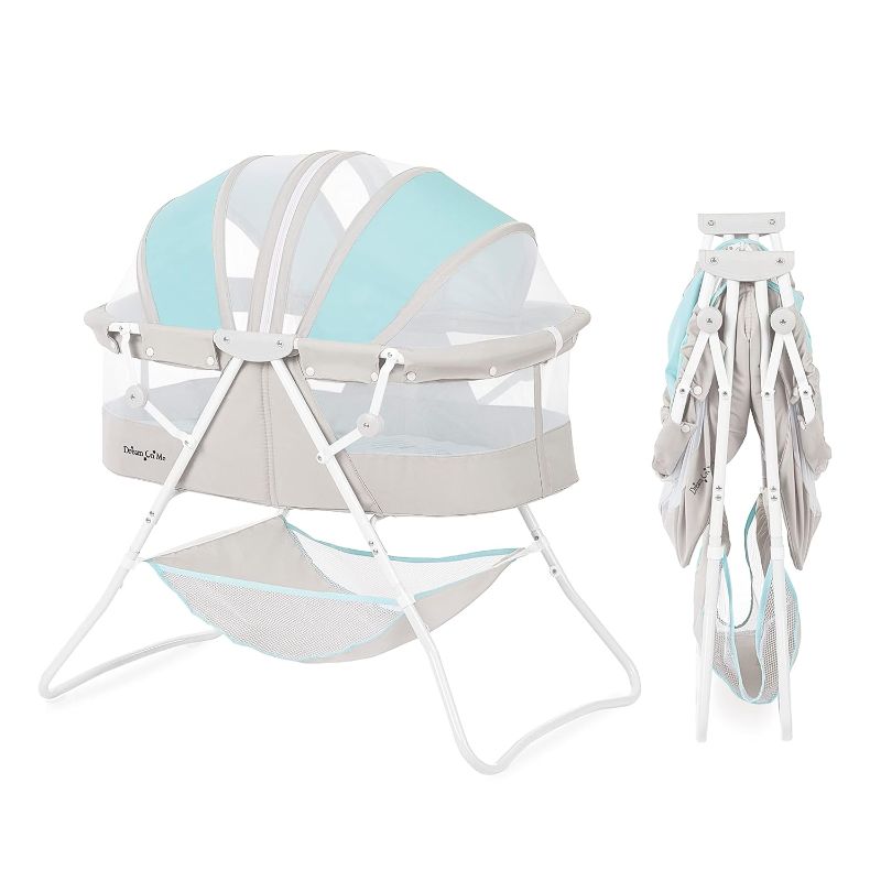 Photo 1 of Dream On Me Karley Bassinet in Blue & Grey, Lightweight Portable Baby Bassinet, Quick Fold and Easy to Carry , Adjustable Double Canopy, Indoor and Outdoor Bassinet with Large Storage Basket.