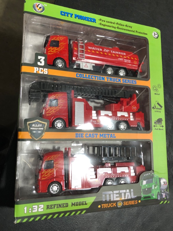 Photo 1 of 3 red truck toys 