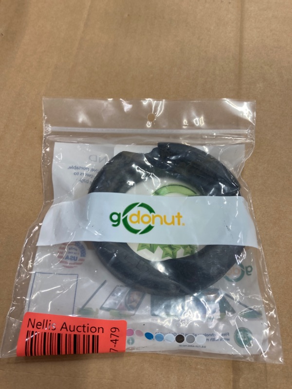 Photo 1 of GoDonut Ultra Phone Stand - Portable Mount Accessory for Travel, Nightstand or Desk- Compatible with Tablet, iPhone & Most Smartphones – Carbon Fiber