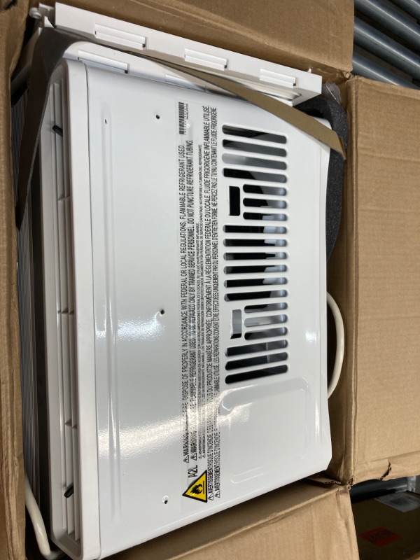 Photo 2 of ***MAJOR DAMAGE TO BACKSIDE, FOR PARTS*** LG LW6024RSMX Window Air Conditioner, Wi-Fi Enabled w/Remote, for Small Room (260 Sq.Ft.), Quiet Operation, 115V, 6,000 BTU, White White 6,000 BTU