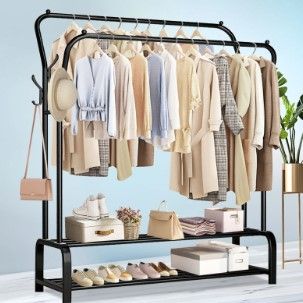 Photo 1 of BAOKALER Metal Clothes Rack Garment Rack for Hanging Clothes, Clothing Garment Rack with 6 Hooks, Clothing Racks or Hanging Racks, Black