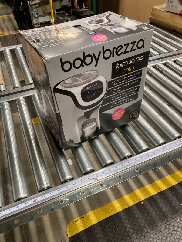 Photo 3 of Baby Brezza Formula Pro Mini Baby Formula Maker – Small Baby Formula Mixer Machine Fits Small Spaces and is Portable for Travel– Bottle Makers Makes The Perfect Bottle for Your Infant On The Go Formula Pro Mini Dispenser Machine