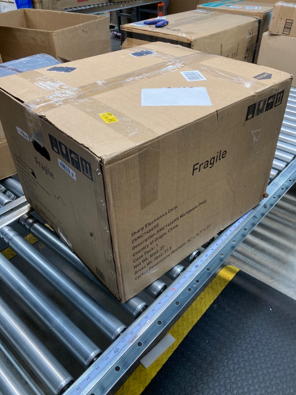 Photo 1 of SHARP ZSMC1464HS Oven with Removable 12.4" Carousel Turntable. Orville Redenbacher's Certified Cubic Feet, 1100 Watt with Inverter Technology Countertop Microwave, 1.4 CuFt, Stainless Steel