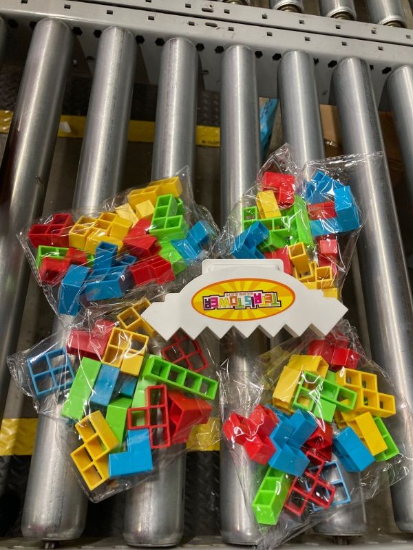Photo 1 of Tetra Tower Game-64 PCS Team Tower Game for Kids & Adults,Tetris Tower Game?Family Board Game, Balance Stacking Block Game Great for Family, Parties, Travel, 64 PCS+22 Card