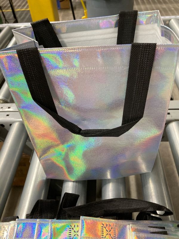 Photo 1 of 12Pcs Iridescent Medium Silver Gift Bags with Black Handles – Shiny Reusable Holographic Gift Bag with a Cardboard - Perfect for Goodie Bags, Party Favor Bags, Birthday Gift Bags. Size 8Wx4lx10H