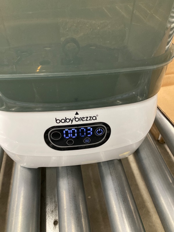 Photo 1 of Baby Brezza Baby Bottle Sterilizer and Dryer Advanced – Electric Steam Sterilization Machine – Universal Sterilizing for All Bottles: Plastic + Glass + Pacifiers + Breast Pump Parts - HEPA Filtration