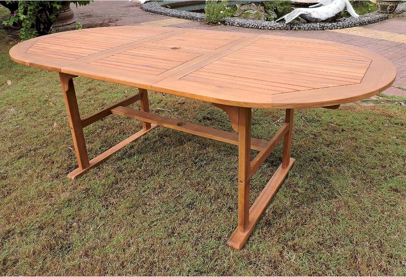 Photo 1 of Royal Fiji Royal Fiji 59-inch/79-inch Oval Extendable Acacia Dining Table with Folding Leaves, Rustic Brown
Brand: International Caravan