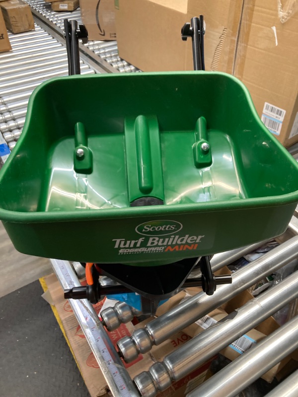 Photo 1 of missing hold up

Scotts Turf Builder EdgeGuard Mini Broadcast Spreader - Holds Up to 5,000 sq. ft. of Lawn Product Single Pack Mini