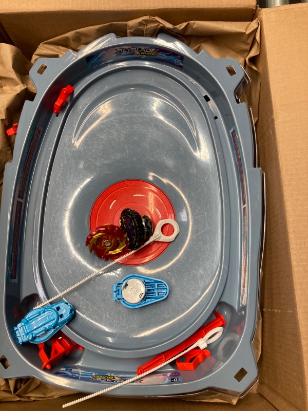 Photo 2 of BEYBLADE Burst Surge Speedstorm Motor Strike Battle Set -- Battle Game playset with Motorized Stadium, 2 Battling Top Toys and 2 Launchers