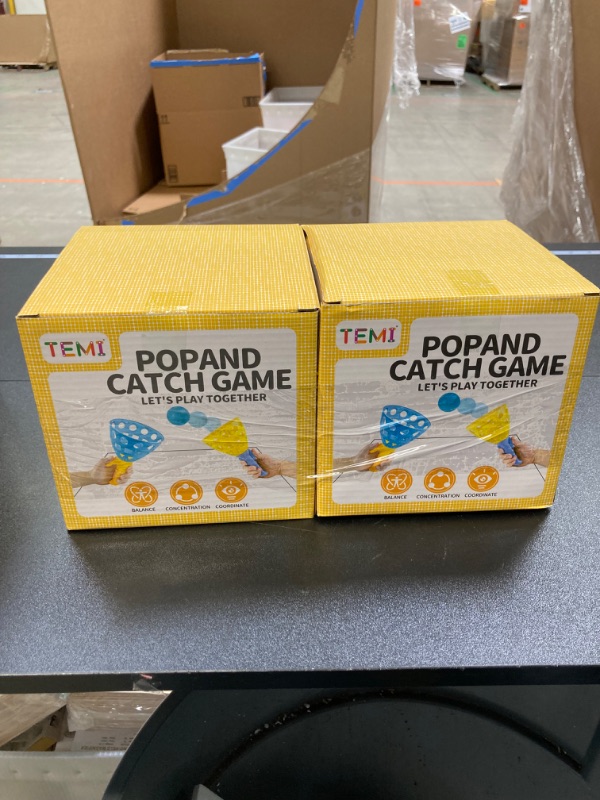 Photo 1 of 2 PIECE BUNDLE DEAL! TEMI Pop Pass Catch Ball Game with 4 Catch Launcher Baskets and 20 Balls, Beach Toys Backyard Outdoor Indoor Game Age 3 4 5 6 7 8 9 10+ Years Old Boys Girls Kids Adults Family Christmas Easter Gifts