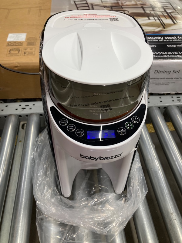 Photo 2 of New and Improved Baby Brezza Formula Pro Advanced Formula Dispenser Machine - Automatically Mix a Warm Formula Bottle Instantly - Easily Make Bottle with Automatic Powder Blending