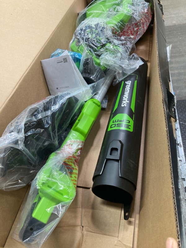 Photo 1 of Greenworks 40V 13-Inch Cordless String Trimmer/Edger and Leaf Blower Combo Kit + 3 Bonus Spools, 2.0Ah Battery and Charger Included