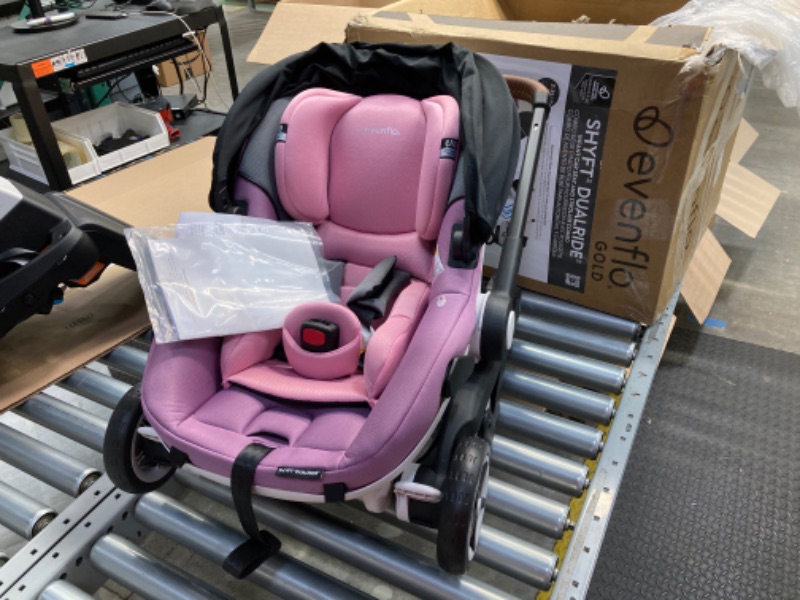 Photo 3 of Evenflo Gold Shyft DualRide with Carryall Storage Infant Car Seat and Stroller Combo (Opal Pink) Gold Shyft DualRide Opal Pink