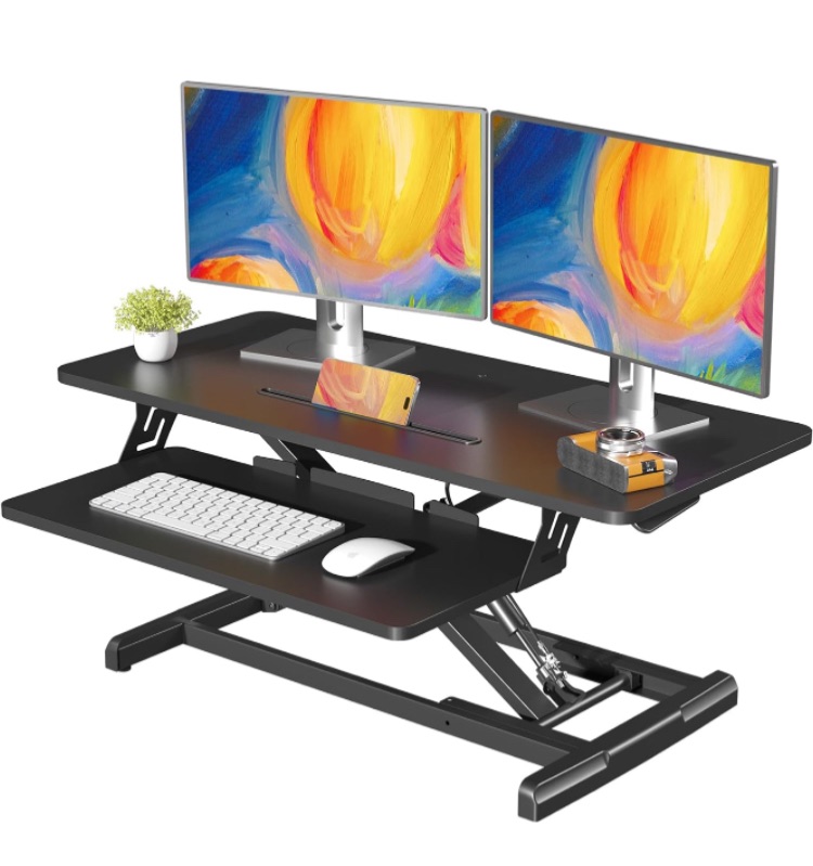 Photo 1 of JOY worker Standing Desk Converter, 35" Wide Height Adjustable Sit Stand Up Desk Riser with Keyboard Tray, Desktop Workstation Riser for Home Office Computer Laptop, Particle Board, Black