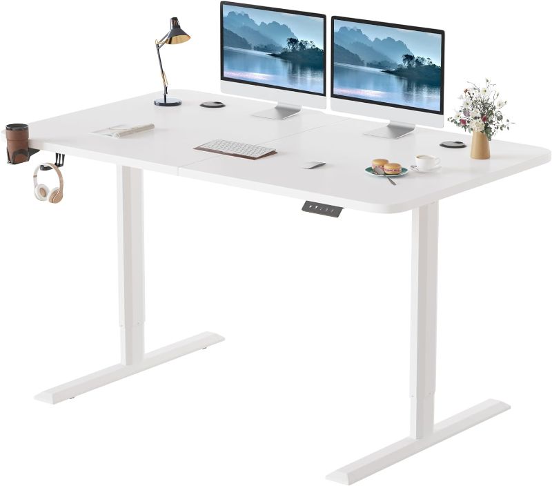 Photo 1 of **NOT EXACT SAME AS STOCK PHOTO** White Electric Standing Desk with controller to raise/lower desk (unknown sizing)