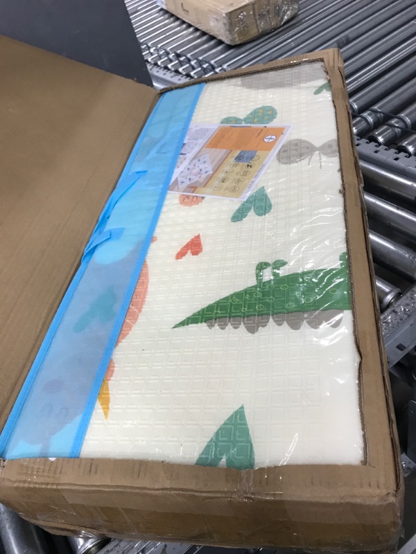 Photo 2 of 79"x 71" x 0.6" Extra Large Waterproof Foldable Baby Floor Play Mat, XPE Foam Playmat for Infants Babies from Newborns to Toddlers, Crawl to Walk, Reversible & Portable Playmat Dino and Track Pattern Dino 79"x 71" x 0.6"