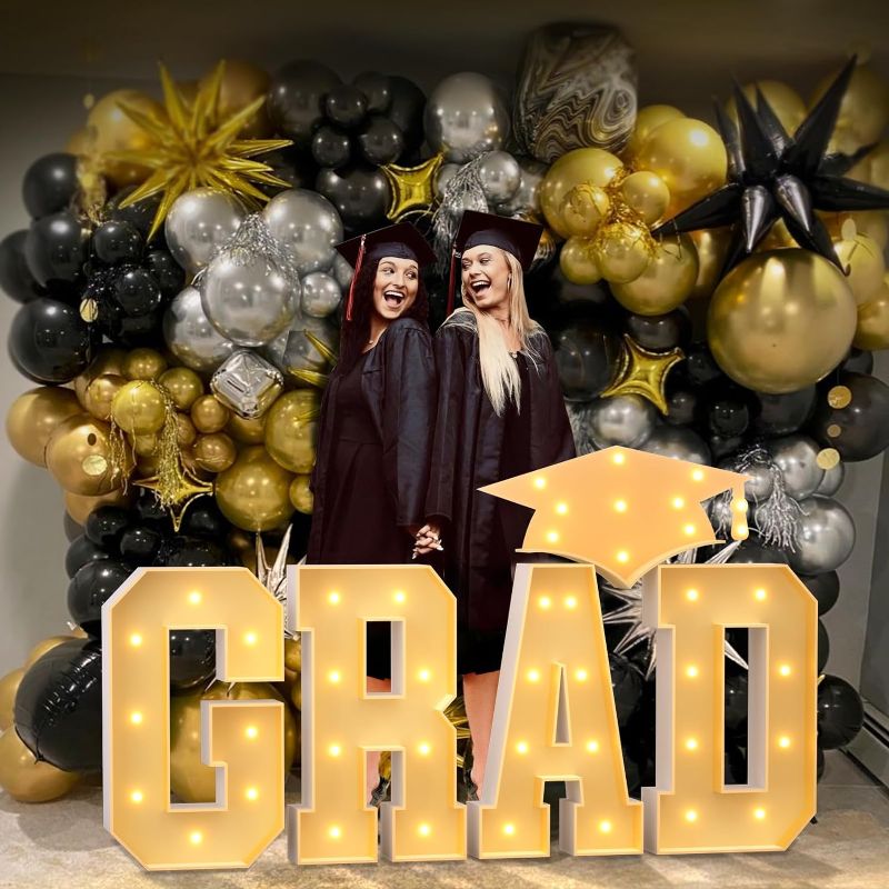 Photo 1 of  Graduation Decorations, 2.3FT LED Marquee Letter Lights Sign Marquee Light Up Letter GRAD Graduation Mosaic Letters Kit for Preschool High School College Graduation Decorations