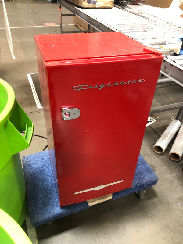 Photo 4 of **Parts only, Has oil leak** Dented Corners Frigidaire 3.2 Cu. Ft. Retro Compact Refrigerator with Side Bottle Opener EFR376, Red