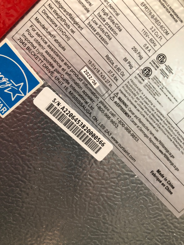 Photo 2 of **Parts only, Has oil leak** Dented Corners Frigidaire 3.2 Cu. Ft. Retro Compact Refrigerator with Side Bottle Opener EFR376, Red