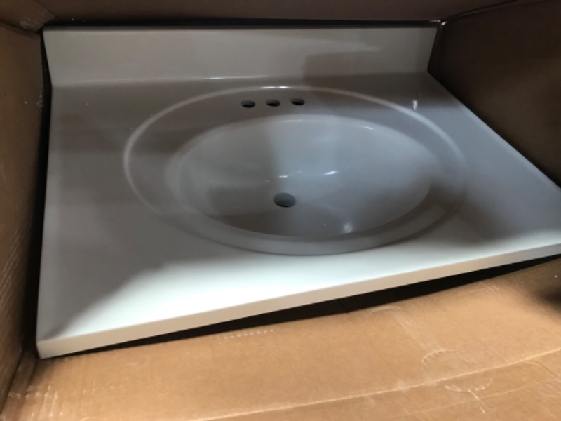 Photo 2 of 
Glacier Bay
31 in. W x 22 in. D Cultured Marble White Round Single Sink Vanity Top in White