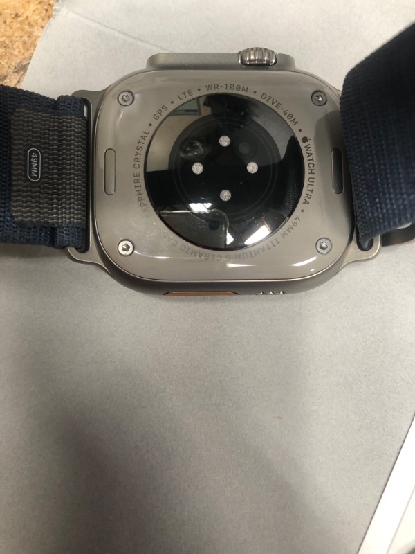 Photo 1 of **NEEDS TO BE CHARGED**
Apple Watch Ultra 2 [GPS + Cellular 49mm] Smartwatch with Rugged Titanium Case & Blue Alpine Loop Medium. Fitness Tracker, Precision GPS, Action Button, Extra-Long Battery Life, Carbon Neutral Titanium Case with Blue Alpine Loop Me