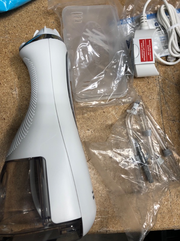 Photo 2 of **ITEM WAS OPENED BUT APPEARS NEW**
Waterpik Cordless Advanced Water Flosser For Teeth, Gums, Braces, Dental Care With Travel Bag and 4 Tips, ADA Accepted, Rechargeable, Portable, and Waterproof, White WP-580 White Water Flosser