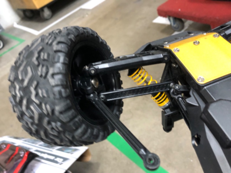 Photo 5 of **one tire is broken , see photo**
PHOUPHO 1:8 Scale RC Cars RC Monster Truck, 55 km/h High Speed Hobby Fast RC Cars for Kids and Adults Toy Gifts?2WD All Terrain Remote Control Cars with Two Rechargeable Batteries
