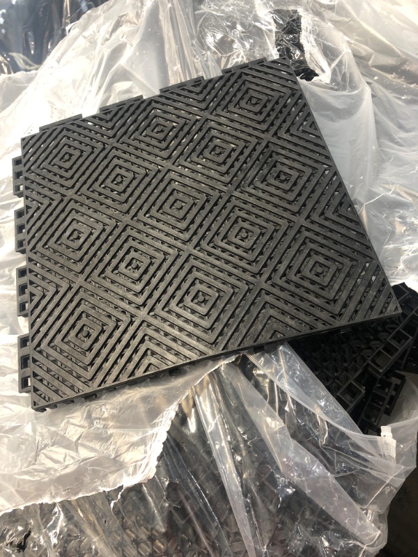 Photo 2 of ***USED - DAMAGED - WARPED - LIKELY MISSING TILES - SEE PICTURES***
Drainage Interlocking Floor Mats 9.8 x 9.8 x 0.5'' PP Drainage Mat with Plastic Grate Non Slip Pool Tiles for Floor Waterproof Shower Drain Pool Patio Balcony Yard PET Area Washer Pad