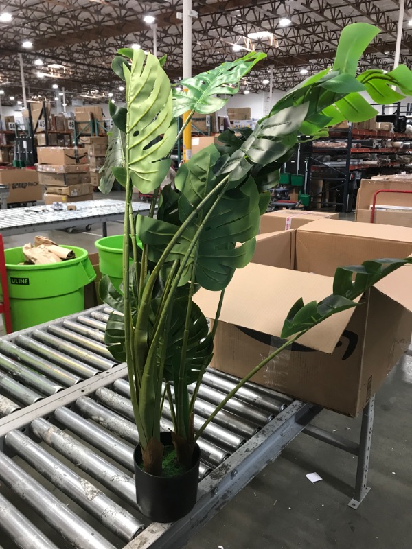 Photo 2 of VIAGDO Artificial Monstera Deliciosa Plant 4ft Tall 15 Decorative Split Leaves Plant Faux Swiss Cheese Plant Fake Tropical Monstera Palm Tree for Home Office Room Store Garden Floor Decor 4ft-1pcs