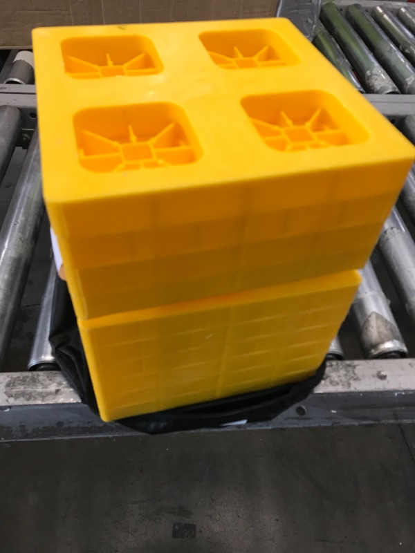 Photo 2 of Camco Heavy-Duty Leveling Blocks | Compatible with Single Wheels, Double Wheels, Hydraulic Jacks, Tongue Jacks and More | Yellow | 10-pack (44510) Leveling Blocks - 10 Pack Frustration Free Packaging