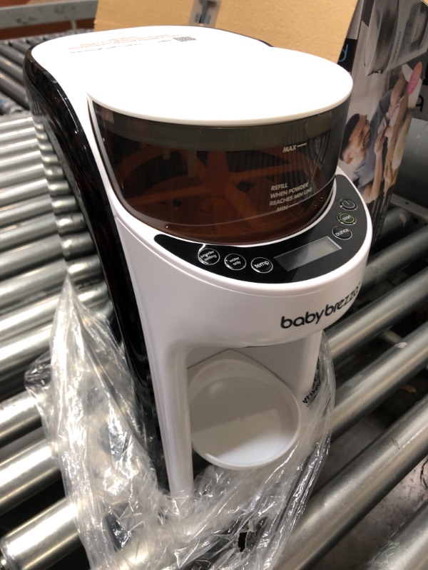 Photo 2 of ***USED - LIKELY MISSING PARTS - UNABLE TO VERIFY FUNCTIONALITY***
New and Improved Baby Brezza Formula Pro Advanced Formula Dispenser Machine - Automatically Mix a Warm Formula Bottle Instantly - Easily Make Bottle with Automatic Powder Blending