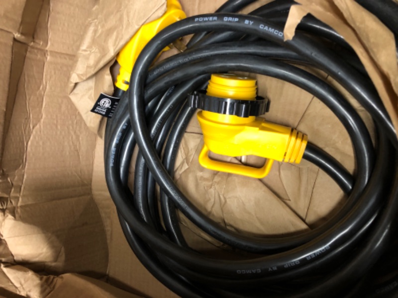 Photo 2 of Camco PowerGrip 25-Foot Camper/RV Extension Cord with 30M/30F- 90 Degree Locking Adapter | Allows for Easy RV Connection to Distant Power Outlets (55524)