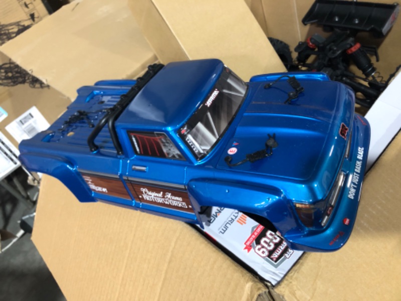 Photo 4 of ARRMA RC Truck 1/10 Outcast 4X4 4S V2 BLX Stunt Truck RTR (Batteries and Charger Not Included) Blue, ARA4410V2T2
