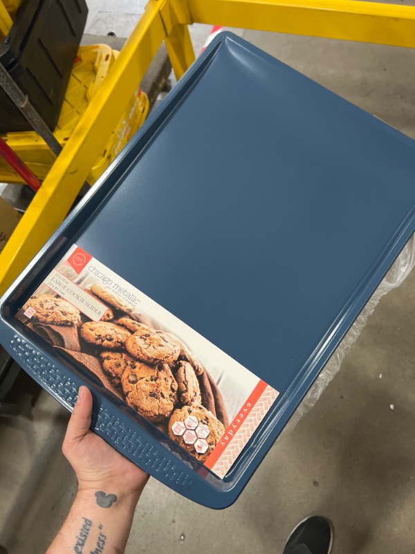 Photo 2 of ***SIMILAR TO STOCK PHOTO*** Chicago Metallic Everyday Non-Stick Large Baking Cookie sheet. Perfect for making cookies, one-pan meals, roasted vegetables, and more Gray Measures 18L x 13W Inches
