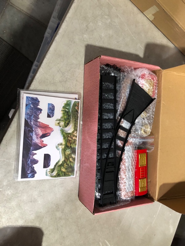 Photo 2 of ***USED - LIKELY MISSING PARTS - UNABLE TO VERIFY FUNCTIONALITY***
TEMI Train Set with Steam Engine, Cargo Car and Long Track for Toddlers 3-5, Rechargeable Battery Operated Play Red Train Toys with Smoke, Light & Sounds, Gift for Kids, Boys & Girls 4-7 Y