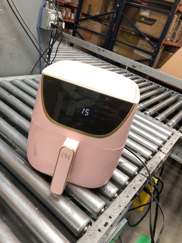Photo 2 of **NEEDS TO BE CLEANED**
Paris Hilton Air Fryer, Large 6-Quart Capacity, Touchscreen Display, 8-in-1 (Air Fry, Roast, Broil, Bake, Reheat, Keep Warm, Pizza, Dehydrate), Dishwasher Safe and Nonstick Basket and Crisper, Pink 6 Liter Pink