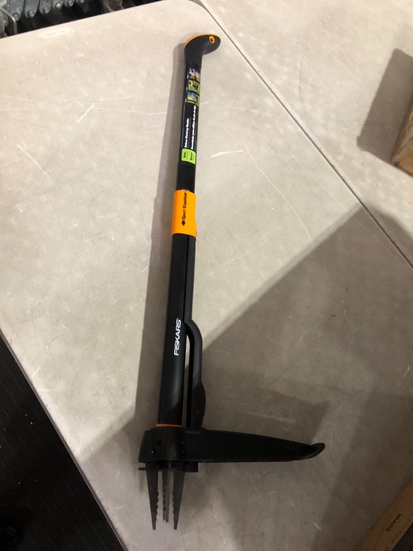 Photo 2 of ***USED - DOESN'T WORK WHEN OPERATED - UNABLE TO TROUBLESHOOT***
Fiskars 4-Claw Stand Up Weeder - Gardening Hand Weeding Tool with 39" Long Ergonomic Handle - Easy-Eject Mechanism - Black/Orange