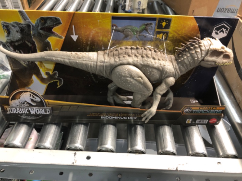 Photo 2 of Jurassic World Indominus Rex Dinosaur Toy with Lights, Sounds, Chomp and Side to Side Neck Motion, Camouflage N Battle I-Rex, Digital Play