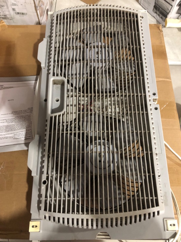 Photo 3 of ***USED*MINOR DAMAGE FROM WEAR*MISSING REMOTE*DIRTY***
Bionaire Window Fan with Twin 8.5-Inch Reversible Airflow Blades and Remote Control, White White 2 Blades Electronic control with LCD screen Window Fan