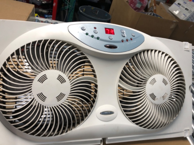 Photo 2 of ***USED*MINOR DAMAGE FROM WEAR*MISSING REMOTE*DIRTY***
Bionaire Window Fan with Twin 8.5-Inch Reversible Airflow Blades and Remote Control, White White 2 Blades Electronic control with LCD screen Window Fan